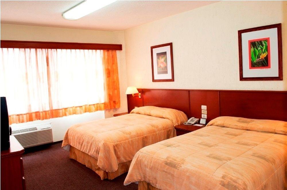 Hotel Marcella Clase Ejecutiva มอเรเลีย ภายนอก รูปภาพ