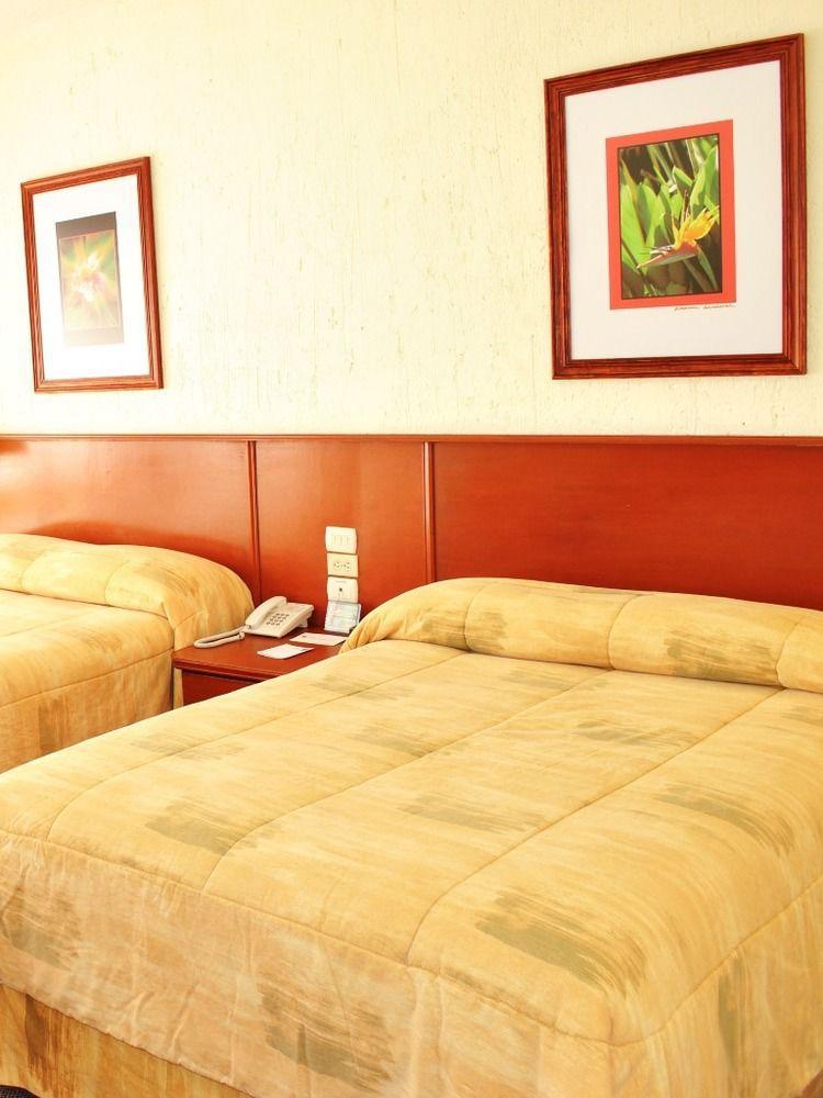 Hotel Marcella Clase Ejecutiva มอเรเลีย ภายนอก รูปภาพ