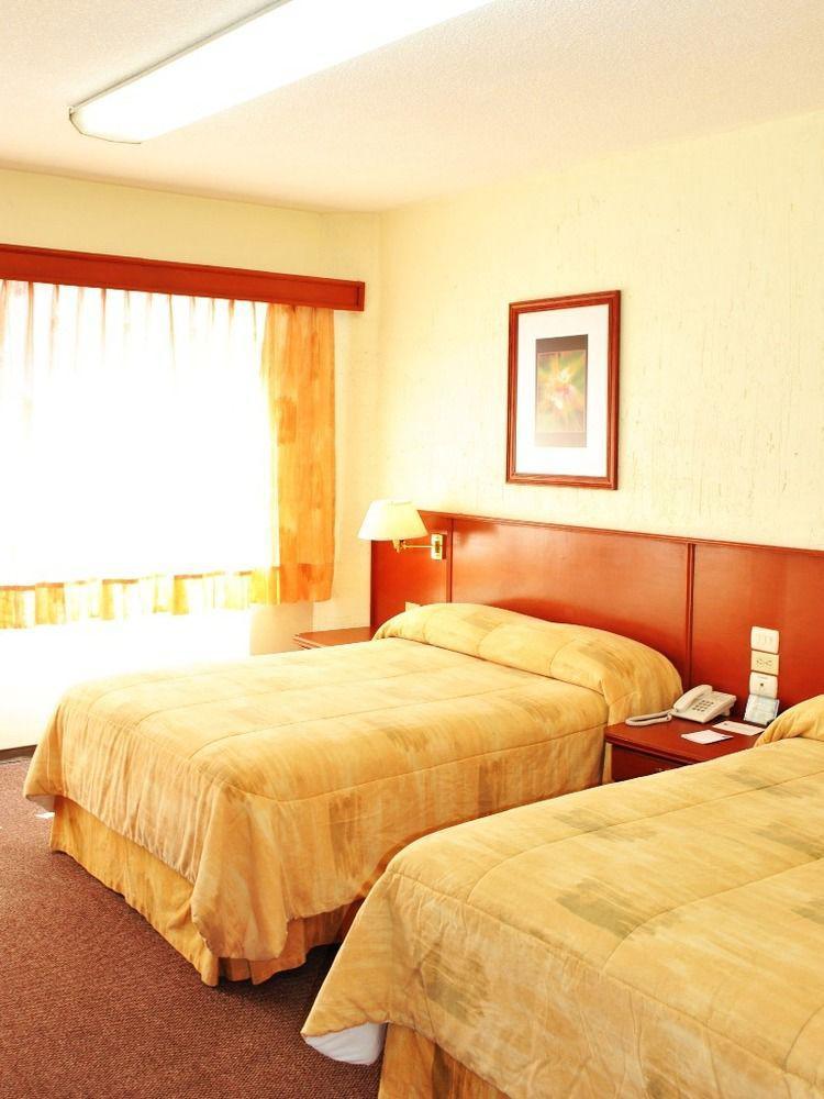 Hotel Marcella Clase Ejecutiva มอเรเลีย ภายนอก รูปภาพ